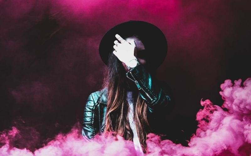 Woman in pink smoke A&R is what is needed to start a record label