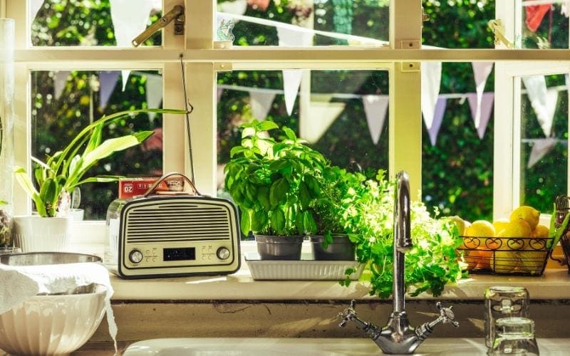 Radio on windowsill in kitchen playing Magic Radio