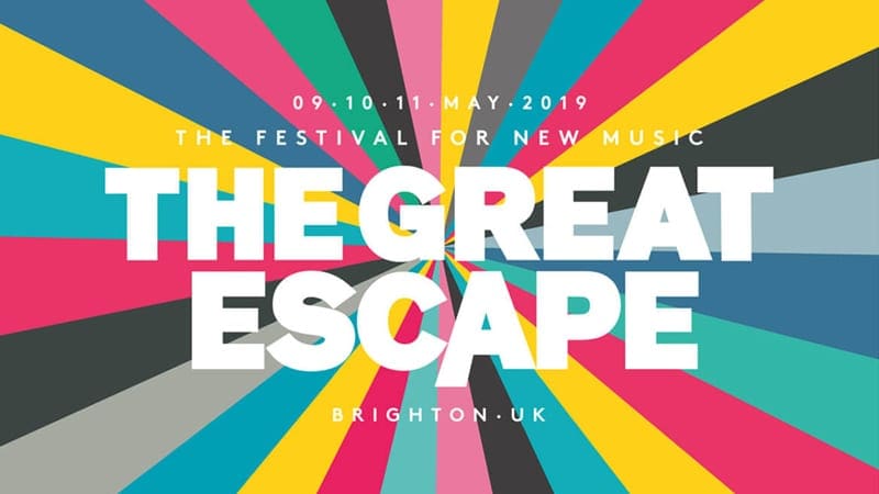 The Great Escape logo in May each year with zoom out colour display behind text in brighton, UK